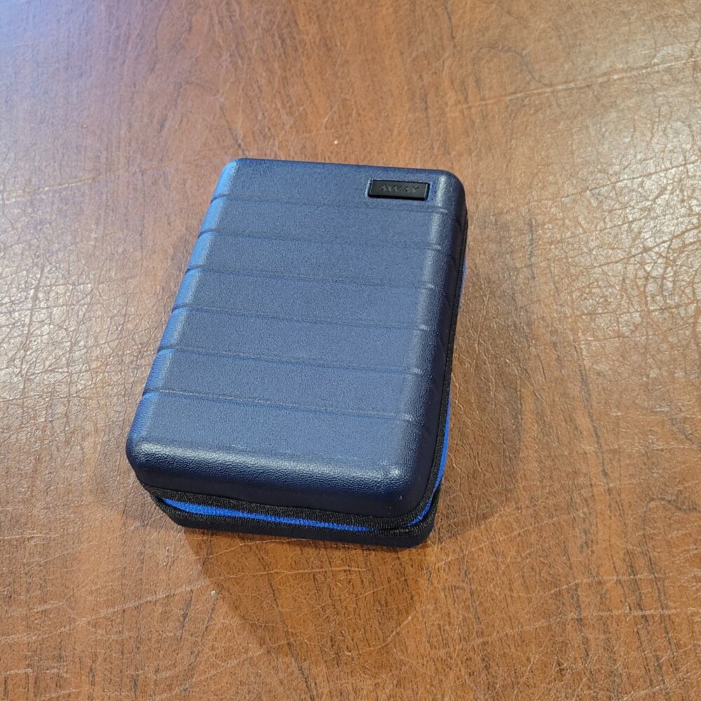 New AWAY Travel The Mini Suitcase Toiletry Case United Polaris Amenity Kit Pouch